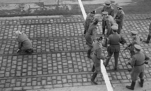 West Berlin policemen and East German Volkspolizei face each other across the border in Berlin, circa 1955. (Photo by Three Lions/Hulton Archive/Getty Images)